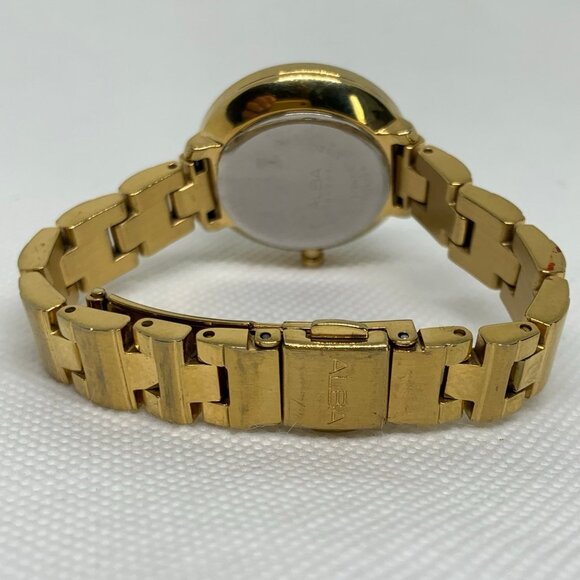 Alba gold tone women date watch 28mm analog fits a small wrist size 5” running - Picture 4 of 7